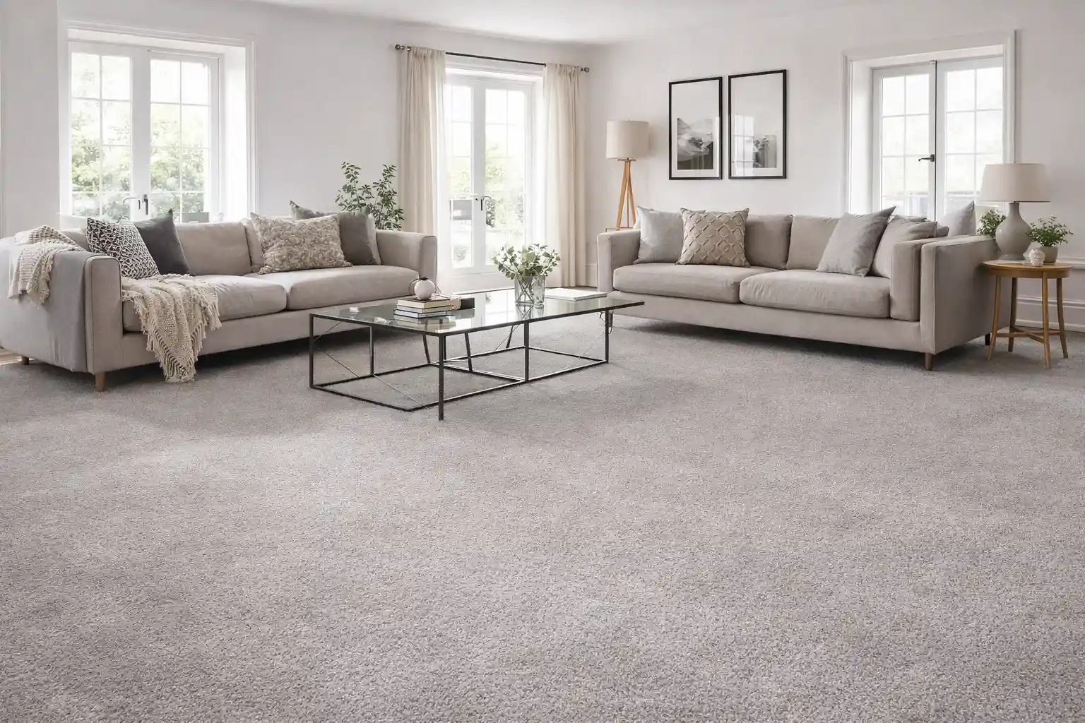 Modern living room with soft grey carpet flooring, sofas and bright interior in Liverpool